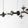 Nova Luce 9009250 ODILLIA Pendelleuchte 7-flammig Schwarz Transparent G9